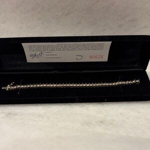 Macy’s Elegant diamond and 14k gold Bracelet
